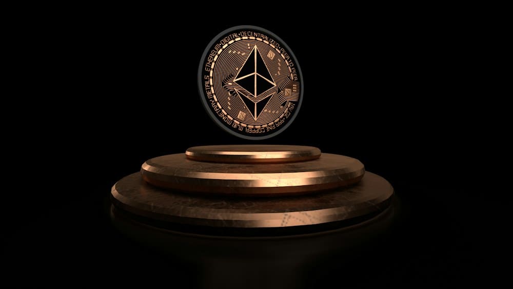 Close-up of a coin bearing the Ethereum diamond logo, illustrating an explainer on what Ethereum is