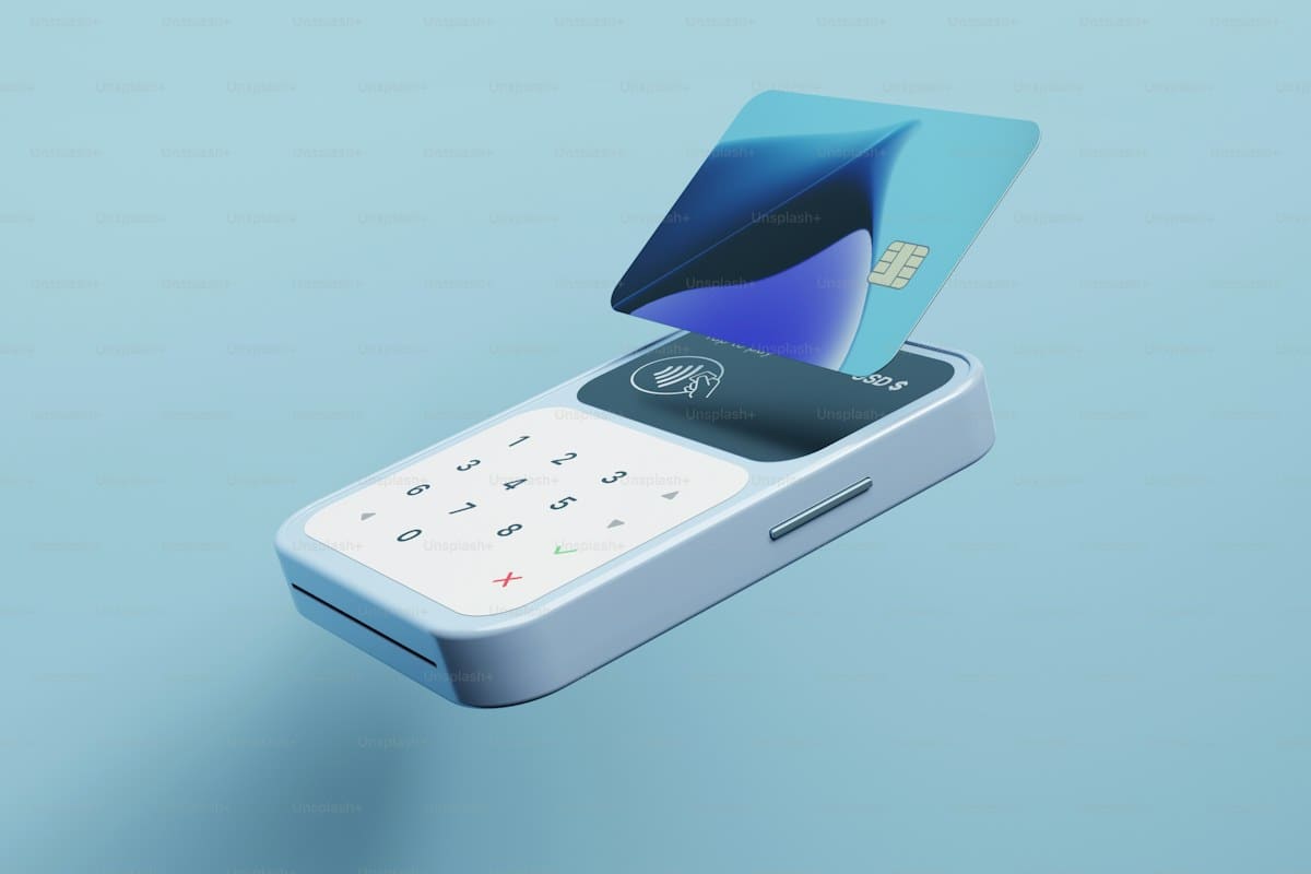 Smartphone and payment card used to buy crypto on be1crypto.com